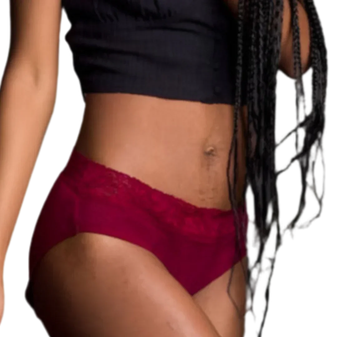 Woman wearing red lace-trimmed leak-proof period underwear, midsection view