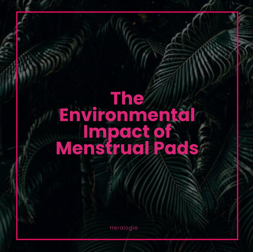 Text about environmental impact of menstrual pads overlaid on dark green tropical leaves.